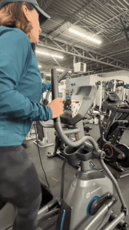The Horizon Fitness EX-59 elliptical machine in motion.