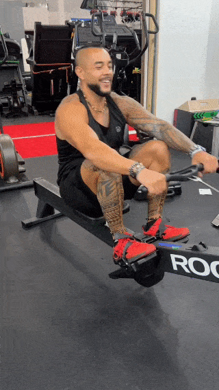 A tester using the Rogue Echo Rower.