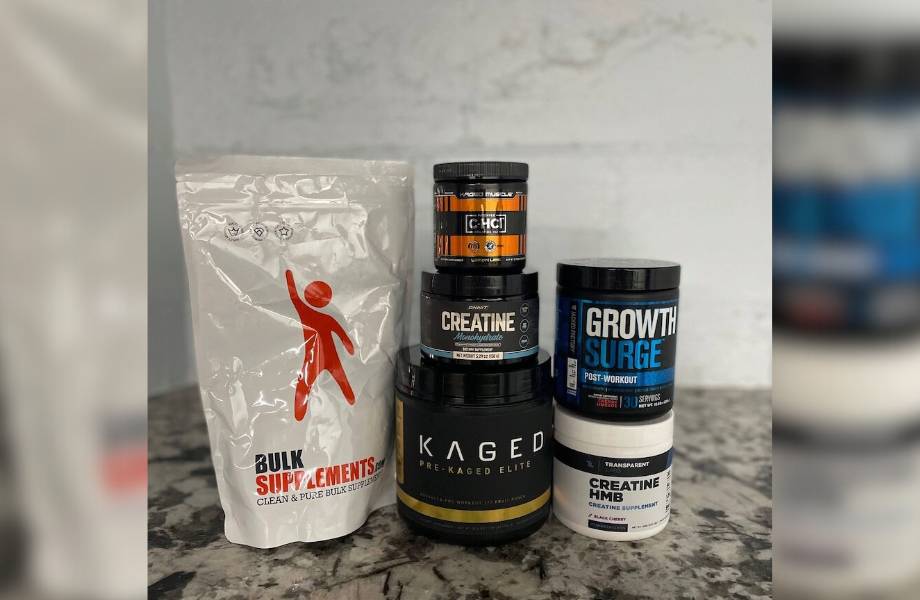 A stack of different creatine powders for the best creatine supplement