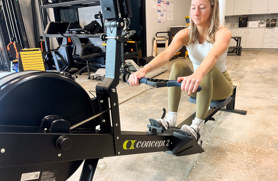 A person using the Concept2 RowErg