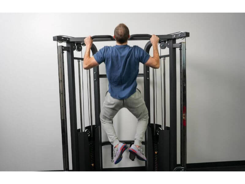 Coop performing pull-ups on the Titan Fitness Functional Trainer