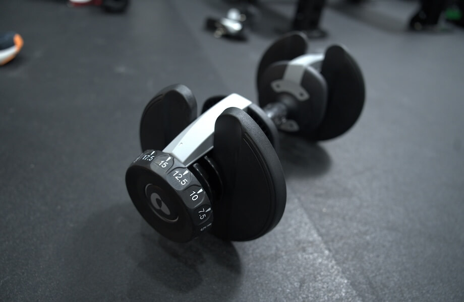 A Bowflex Results Series 552 SelectTech adjustable dumbbell set to 15 pounds