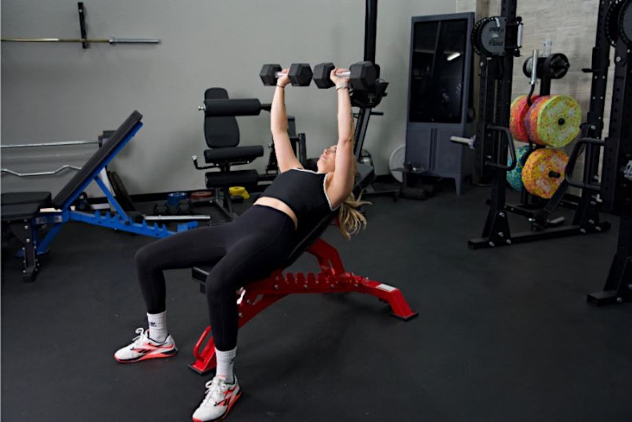 A person working out on the Major Fitness Adjustable Bench