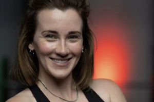 A headshot of Nicole Davis, the director of content for Garage Gym Reviews