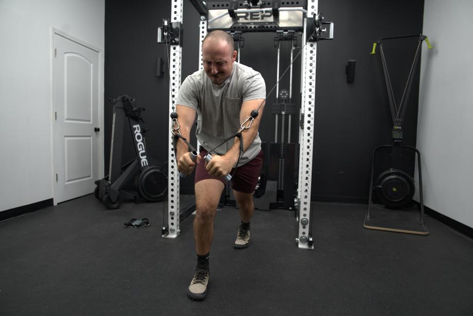 Man performing chest flyes on the REP Ares 2.0
